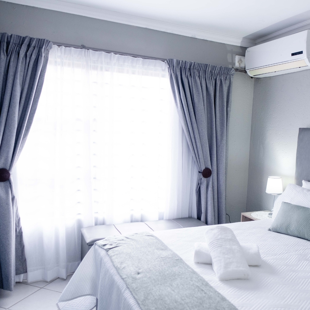 Luxe Bedrooms — grey curtains