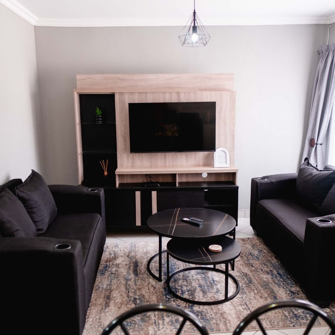 Living — black sofas